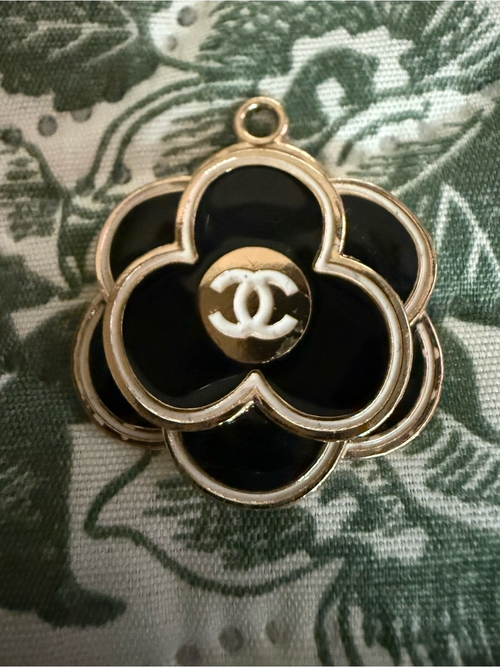 FASHION CHANEL Black and Gold Camellia Logo Pendant Charm.